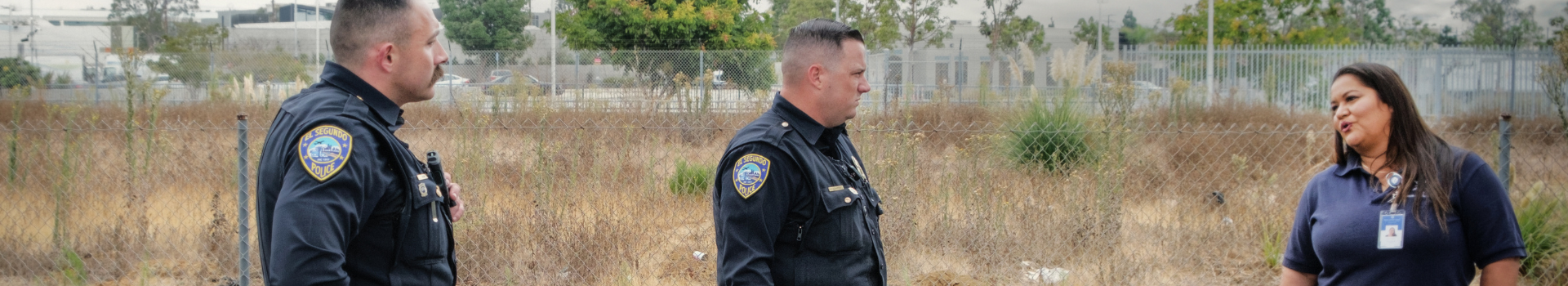 PATCHES Team in the field, two officers and lady talking